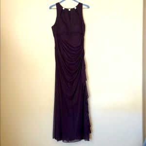 Deep plum colored floor length dress with side ruching / ruffle.